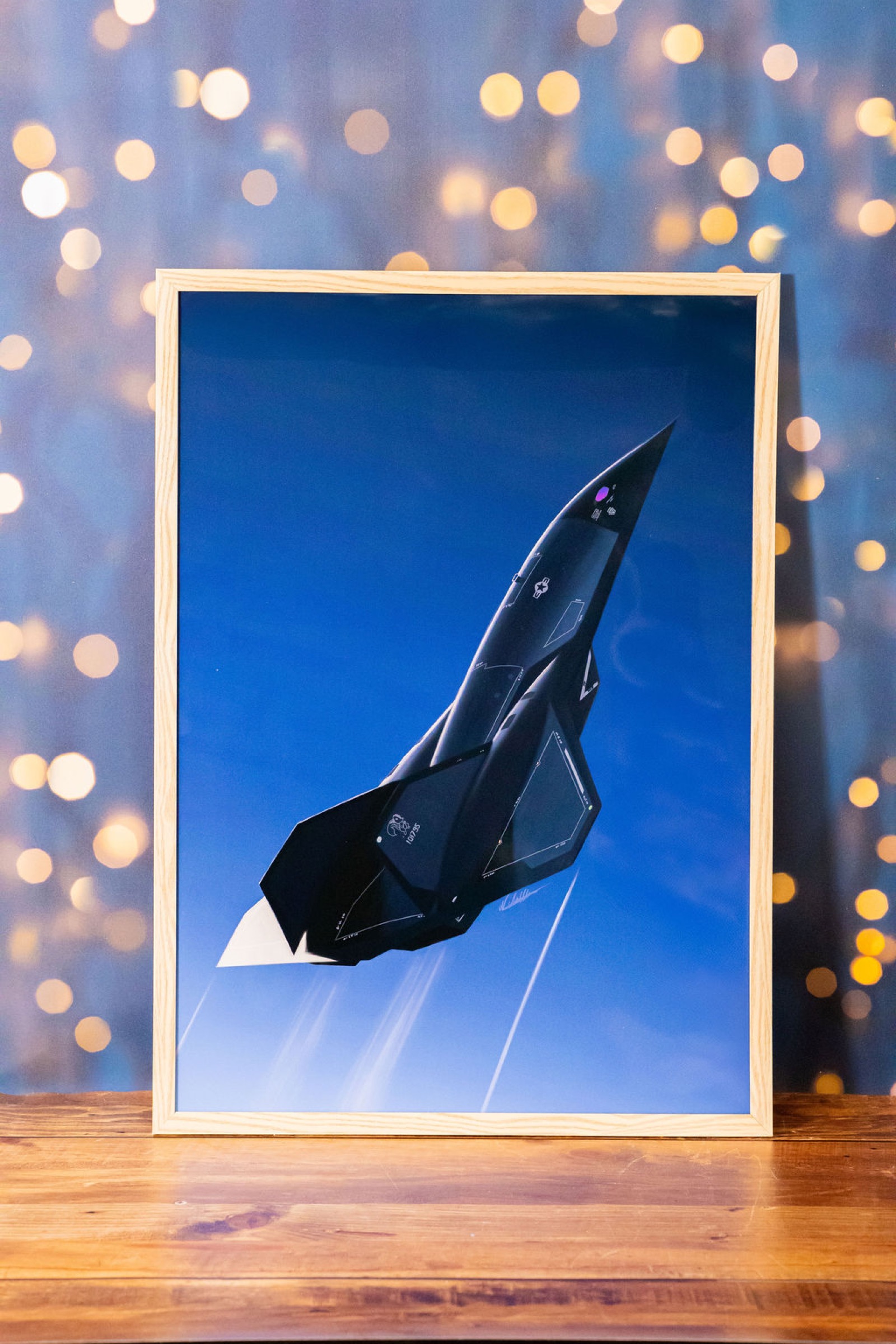 Vertical framed aircraft print at home